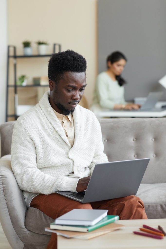 Man learning at home